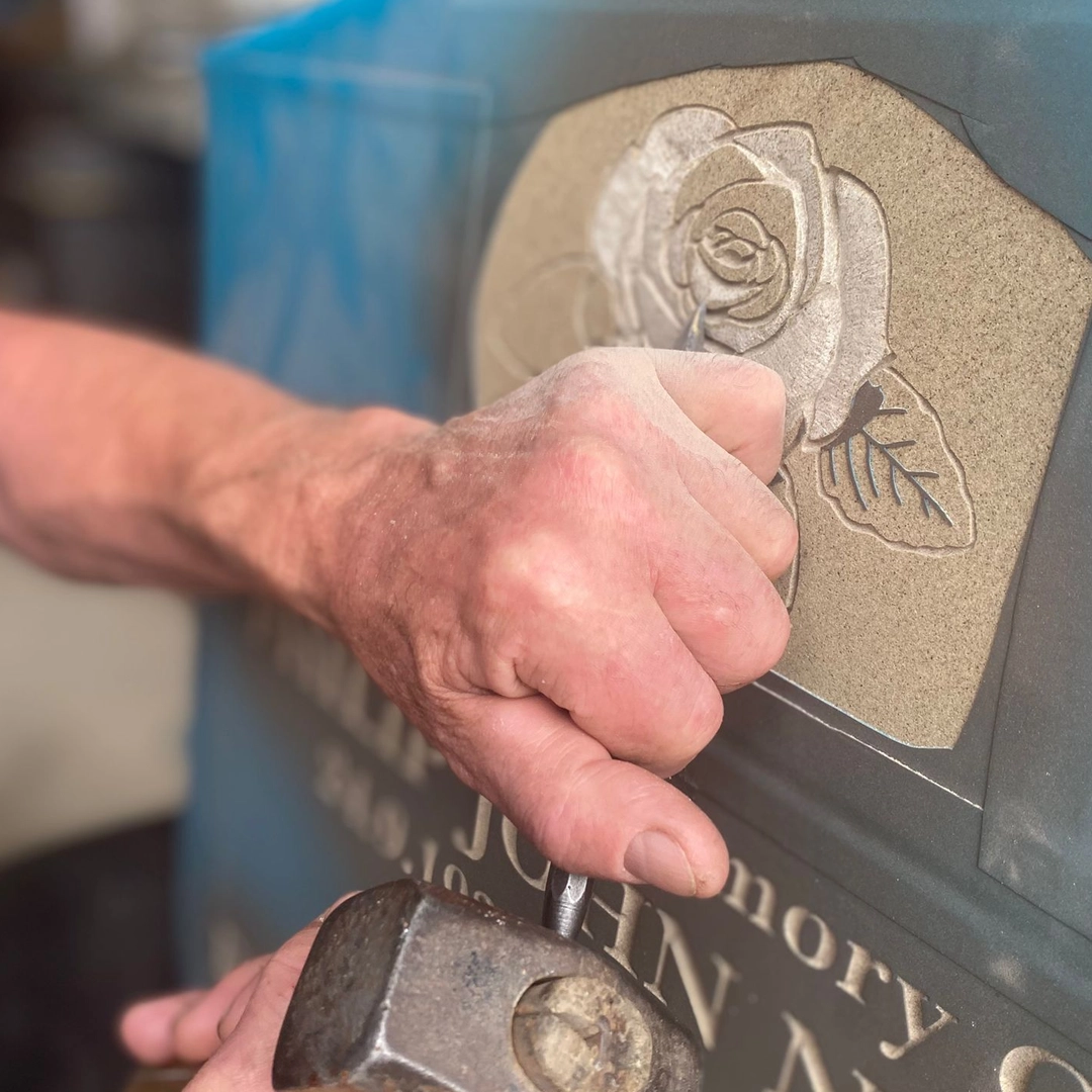 Photo of Chris Completing Headstone Restoration